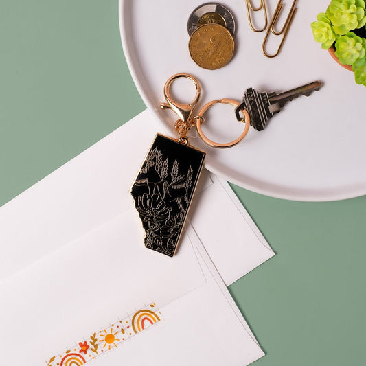 Alberta Black & Gold Enamel Mountain Keychain
